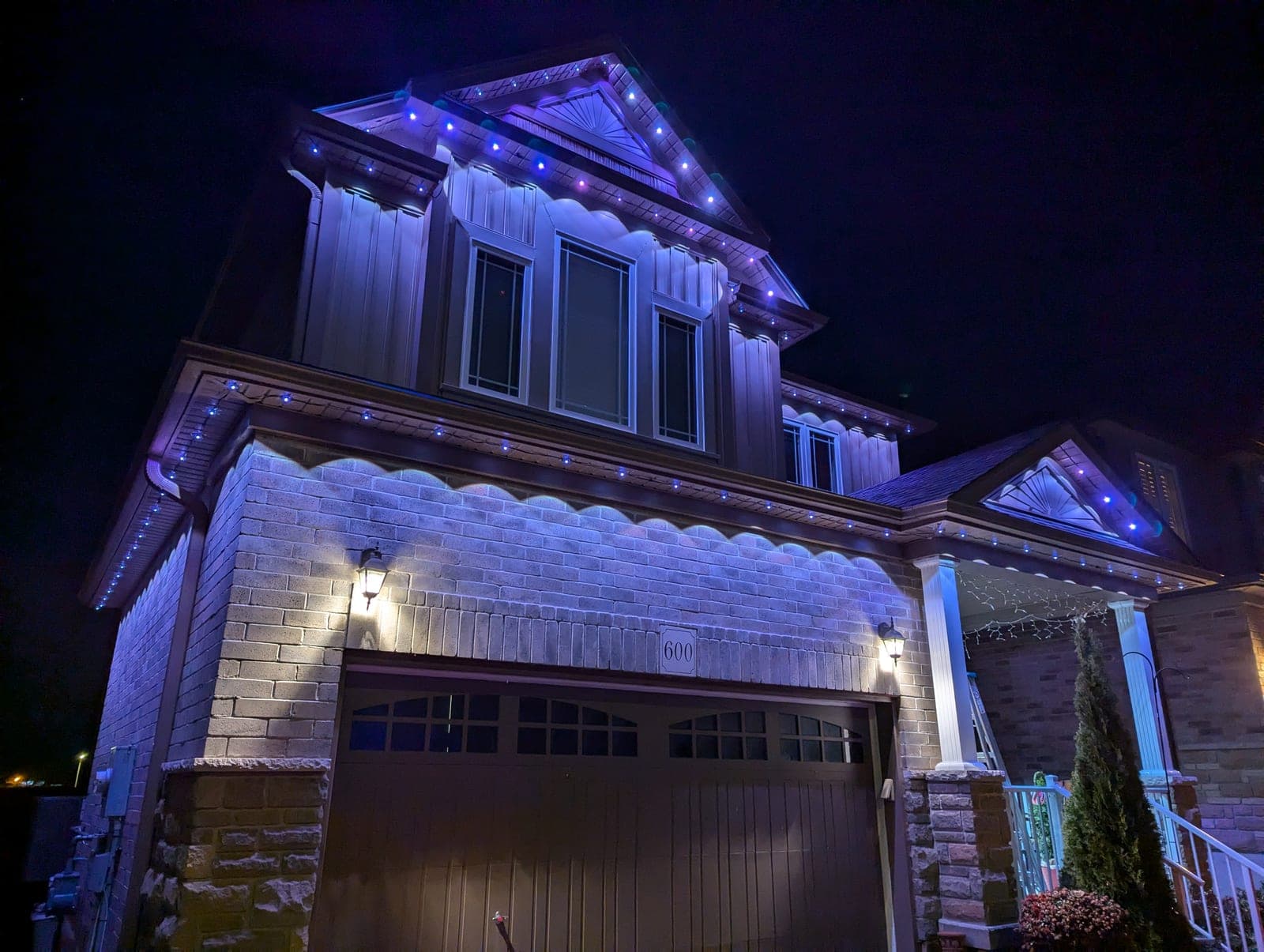 Comparison of warm white, multicolour and RGB LED lighting schemes along the roofline of a Southern Ontario home